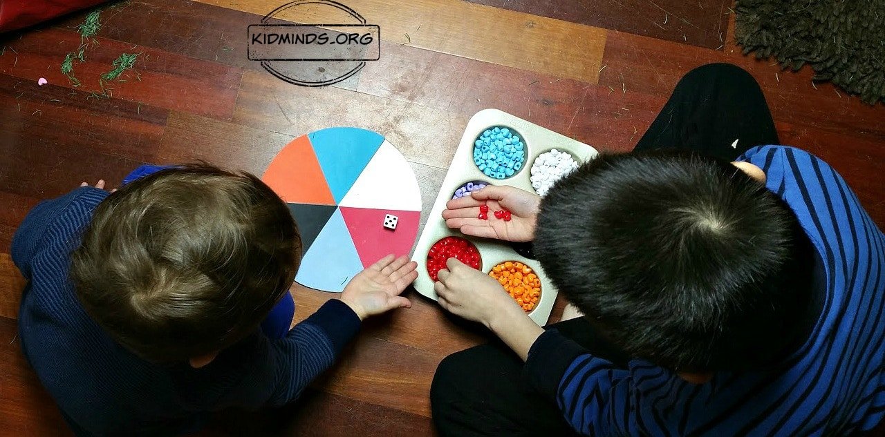 Active Math: Roll, Count, Run and Stick.  Let kids burn some energy without leaving the house with this fun game. Your kids will have so much fun sorting and counting they will be asking for it every day.  #activemath #ponybeadsmath
