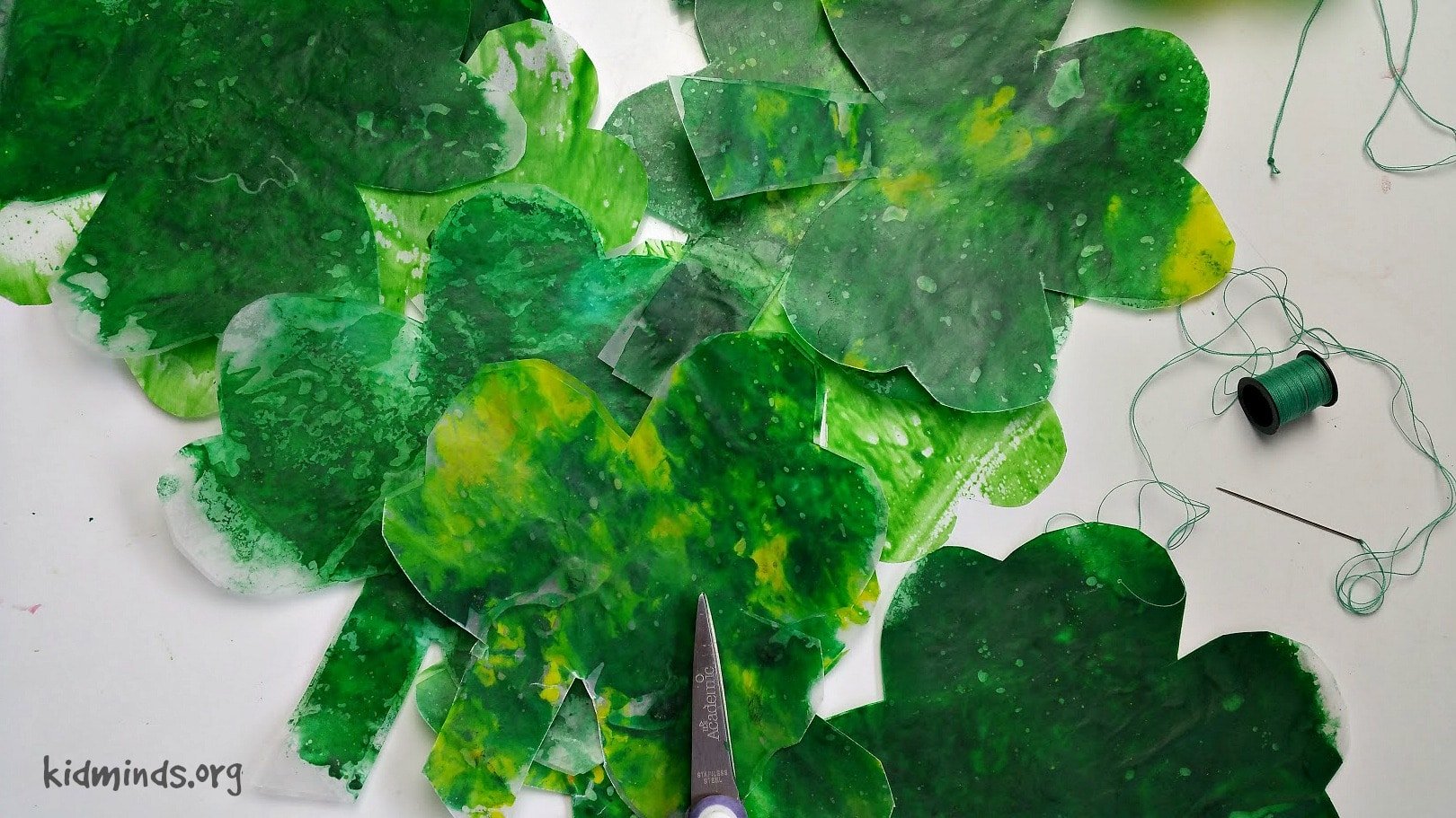  Ever since we discovered that melted crayons offer endless opportunity for exploration, we’ve been doing some variation of this project for each holiday, and of course, we made melted Shamrock leaves for St. Patrick's Day.  