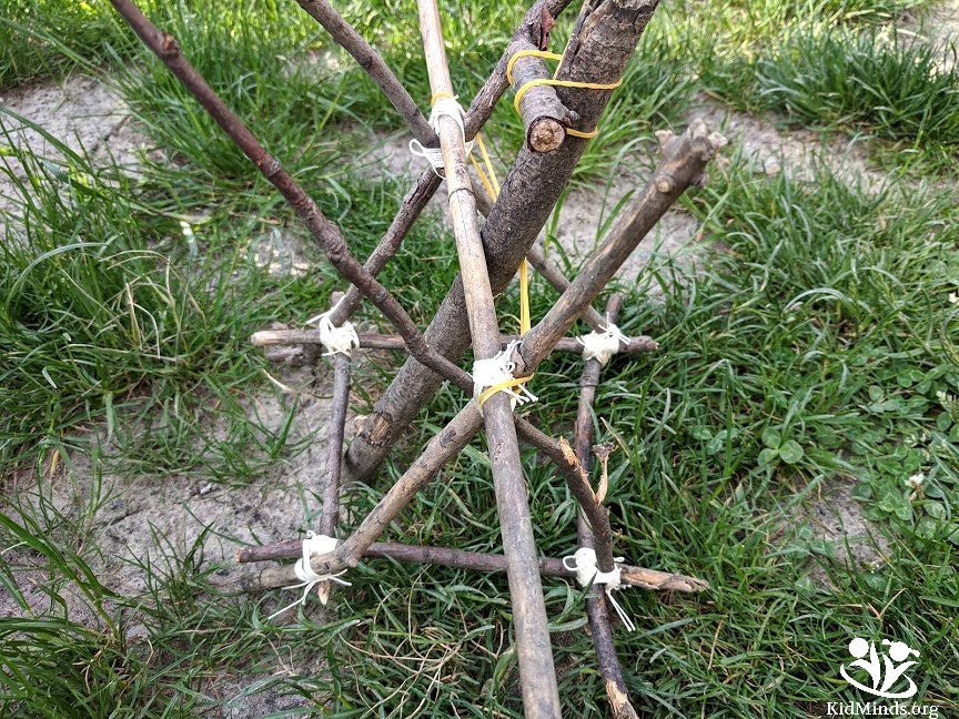 Can you build an Ewok catapult from sticks and stones with your little Star Wars fan? You bet! #kidsactivities #backyardscience #STEAM #handsonlearning #summer #kidminds #laughingkidslearn